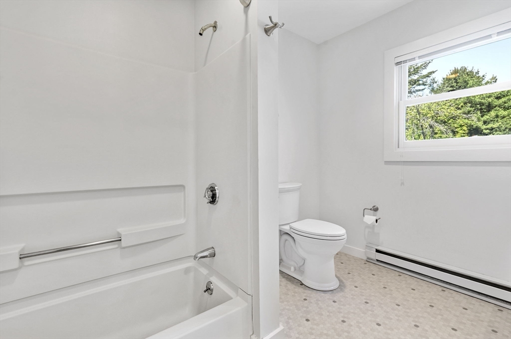 58 Front Street Northampton, MA 01053 - Photo 30 of 42 a bathroom with a toilet and a shower