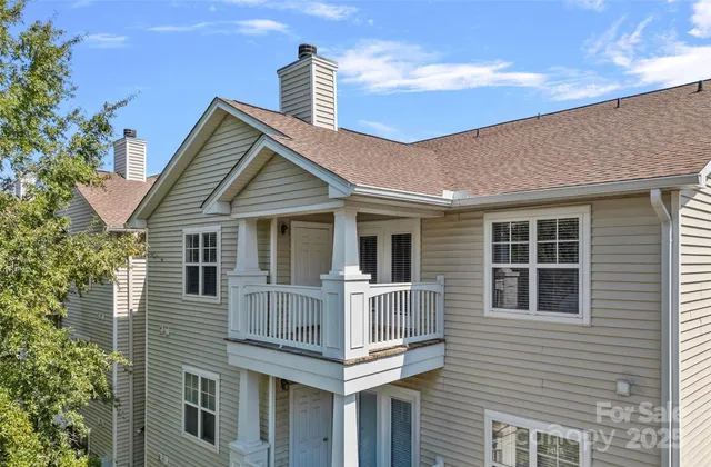 a front view of a house with balcony