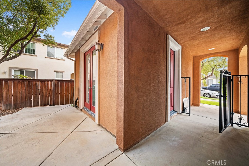 10877 Cameron Court Corona, CA 92883 - Photo 2 of 31 a view of a house with a balcony