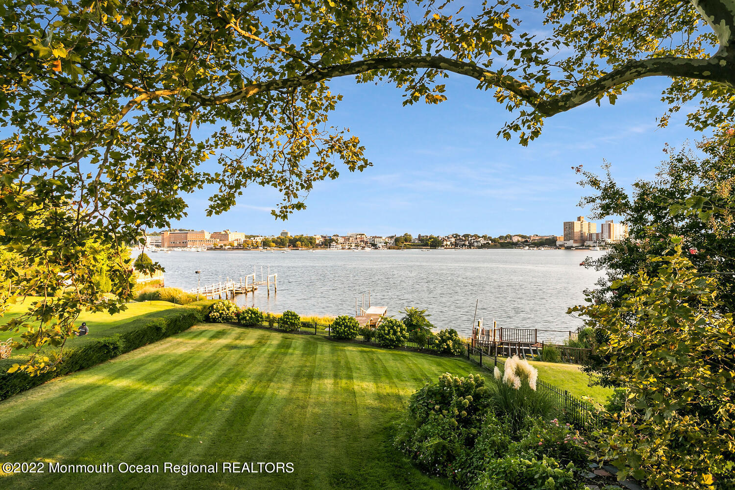 a view of a lake with a building in the background