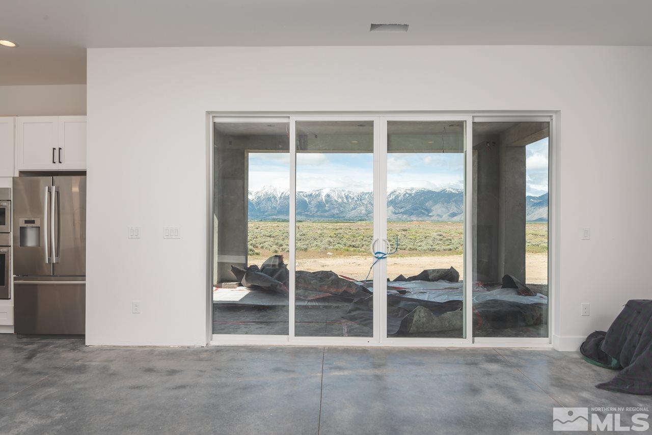 2006 East Valley Road Minden, NV 89423 - Photo 11 of 25 a view of empty room with floor to ceiling window