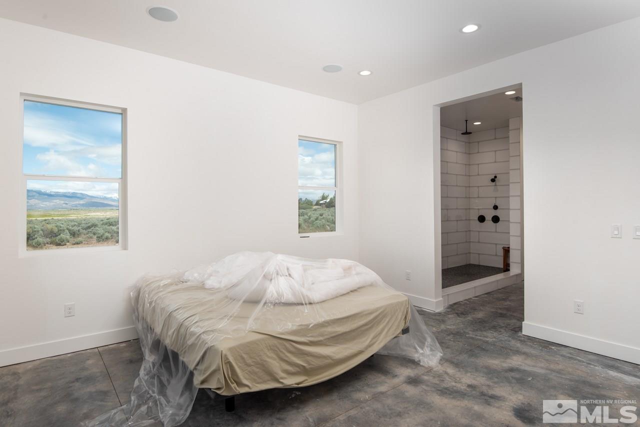 2006 East Valley Road Minden, NV 89423 - Photo 14 of 25 a bedroom with a bed and a window