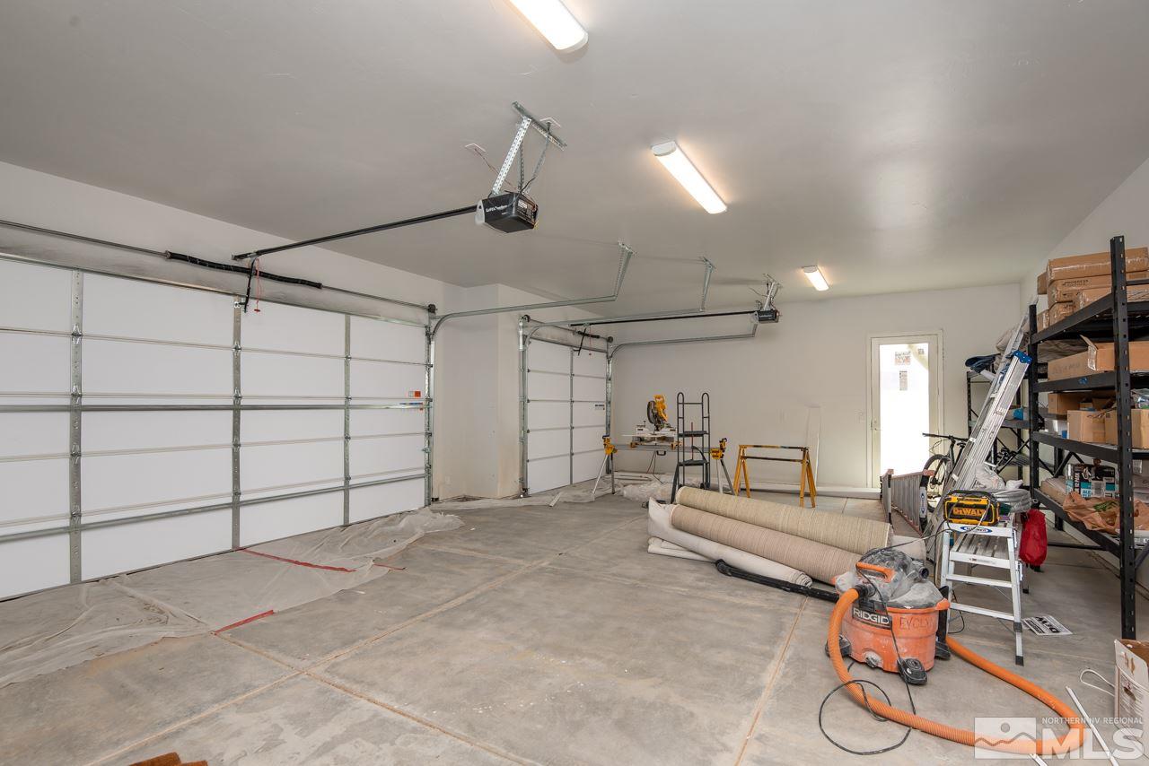 2006 East Valley Road Minden, NV 89423 - Photo 21 of 25 a view of a garage with gym equipment