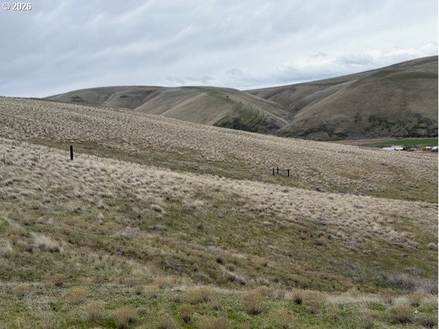 a view of ocean and mountains
