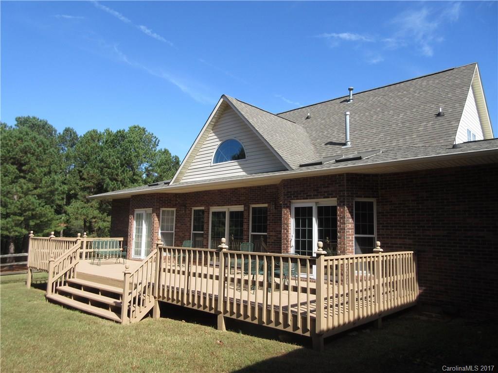 6235 Miller Road Kannapolis, NC 28081 - Photo 8 of 24 a view of a house with a wooden deck
