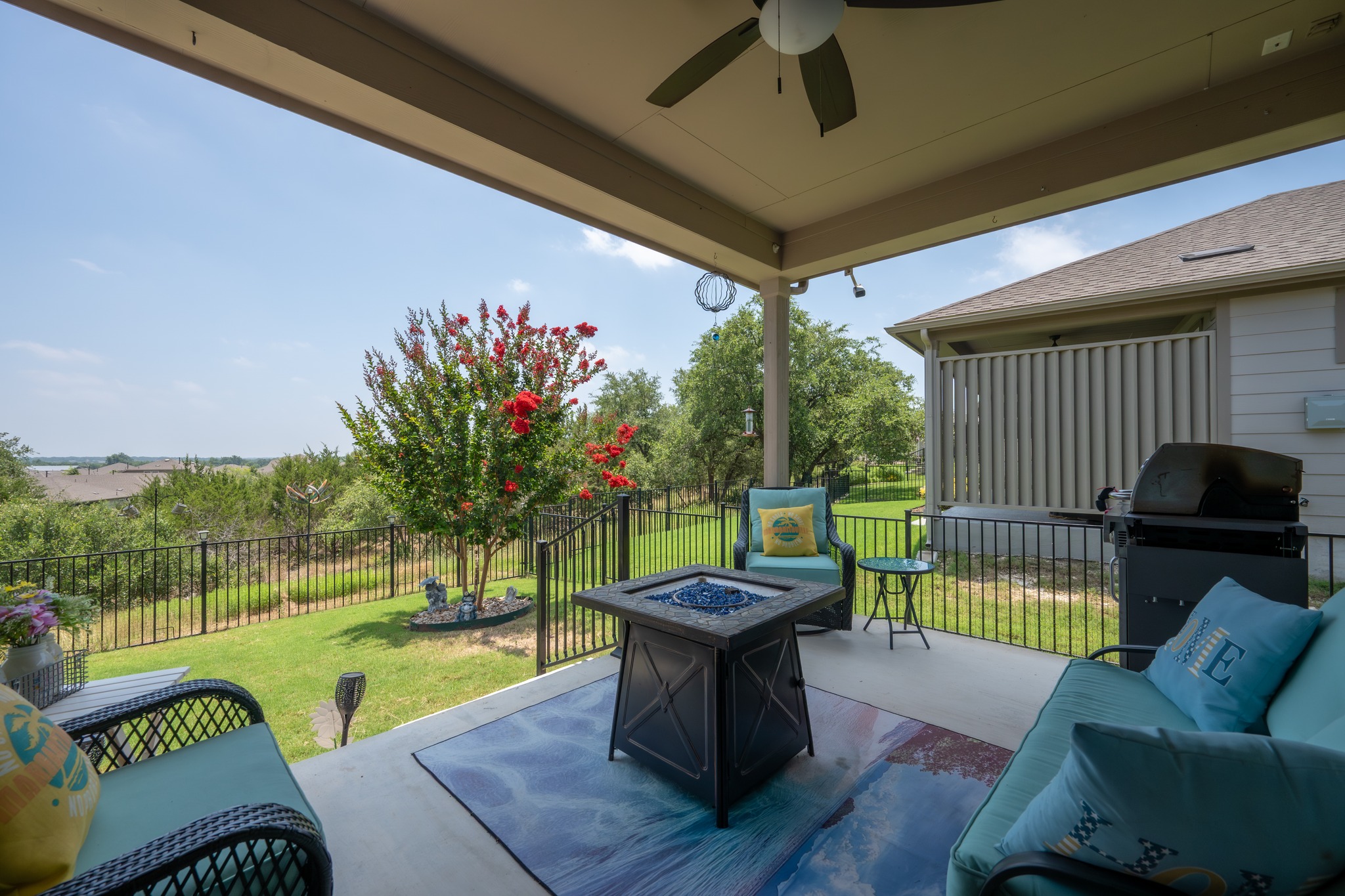 202 Yorktown Street Georgetown, TX 78633 - Photo 19 of 35 Unwind on the covered patio or relax in the hot tub and enjoy serene views.