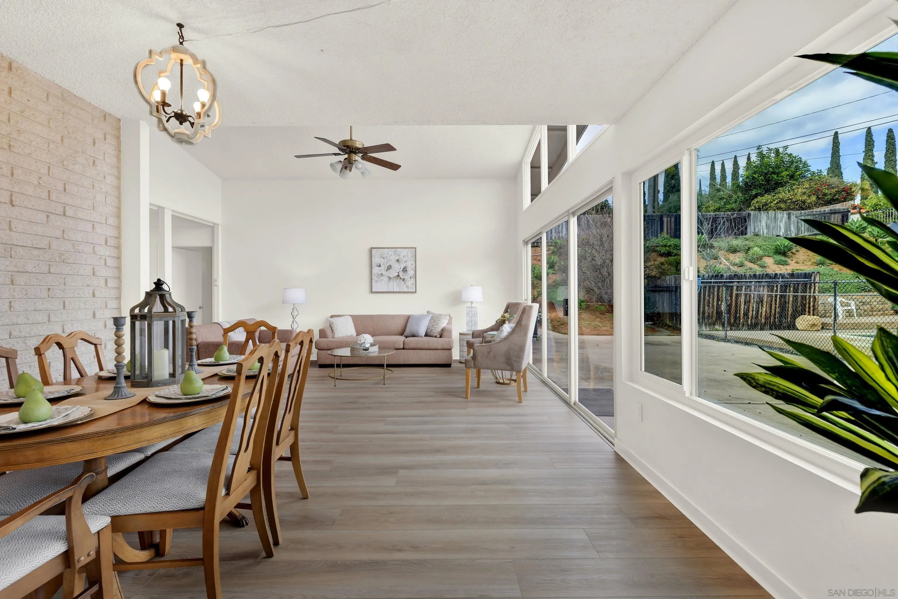 14545 Hillndale Way Poway, CA 92064 - Photo 13 of 52 a view of a dining room with furniture window and wooden floor