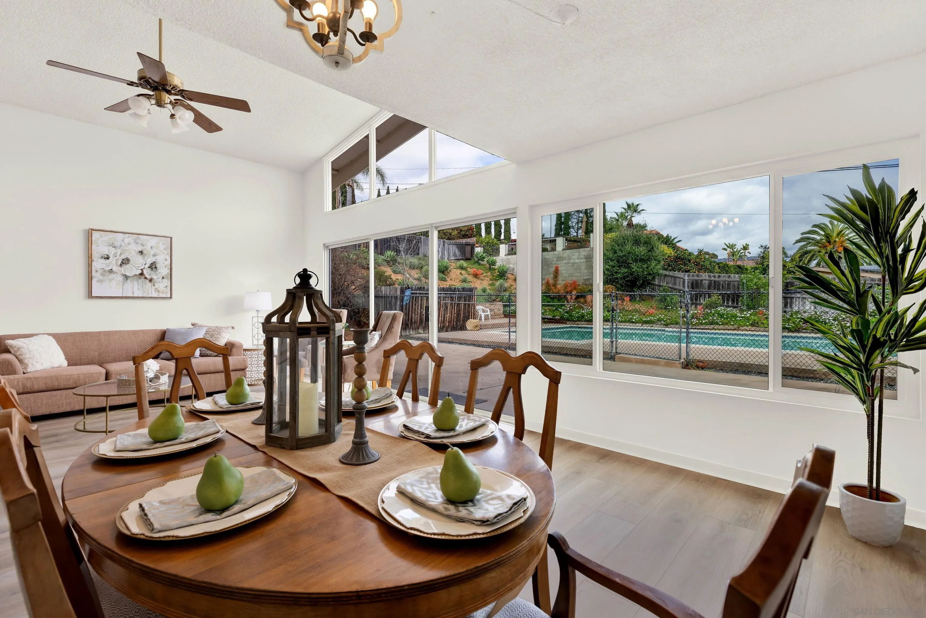 14545 Hillndale Way Poway, CA 92064 - Photo 14 of 52 a living room with furniture and a floor to ceiling window