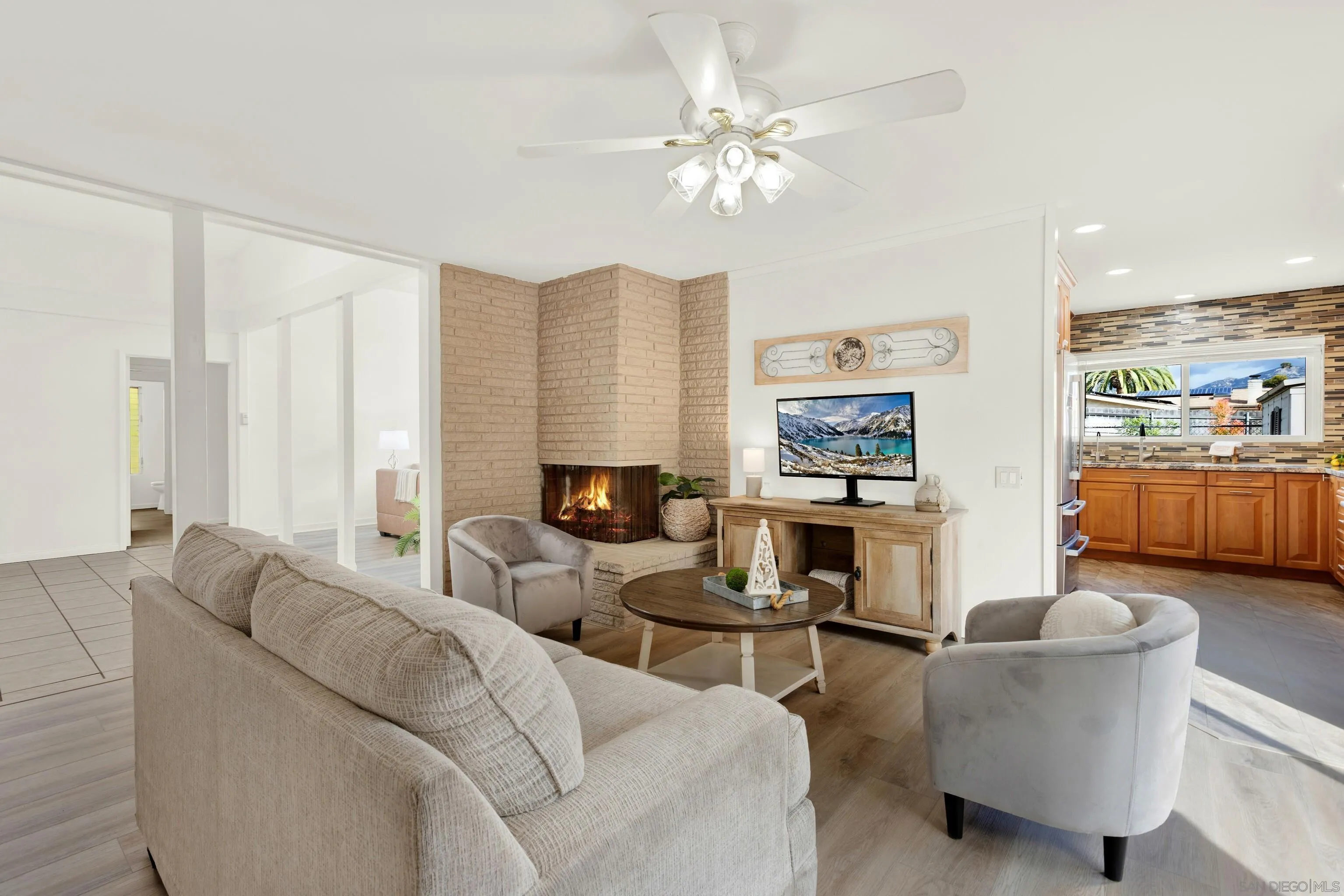 14545 Hillndale Way Poway, CA 92064 - Photo 21 of 52 a living room with furniture and a fireplace