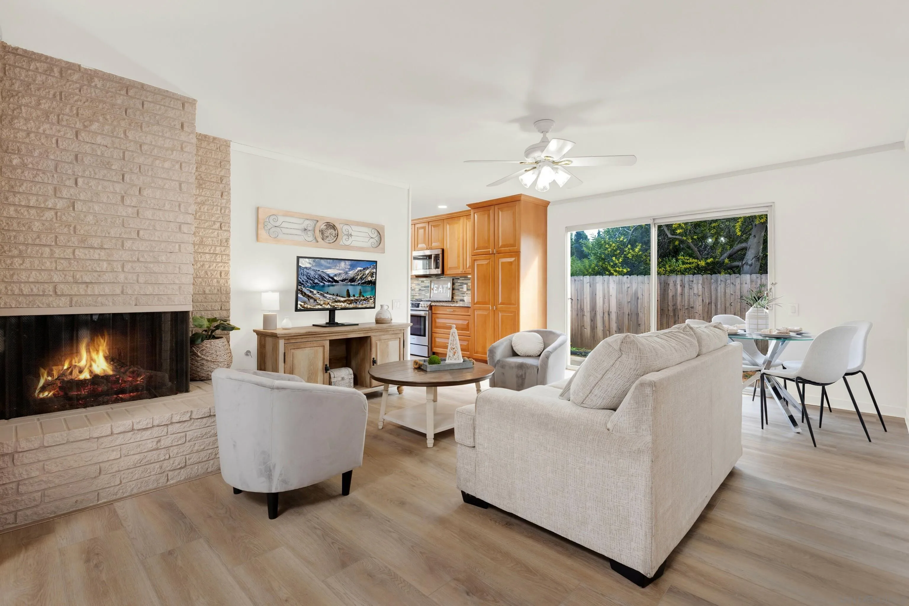14545 Hillndale Way Poway, CA 92064 - Photo 23 of 52 a living room with furniture and a fireplace