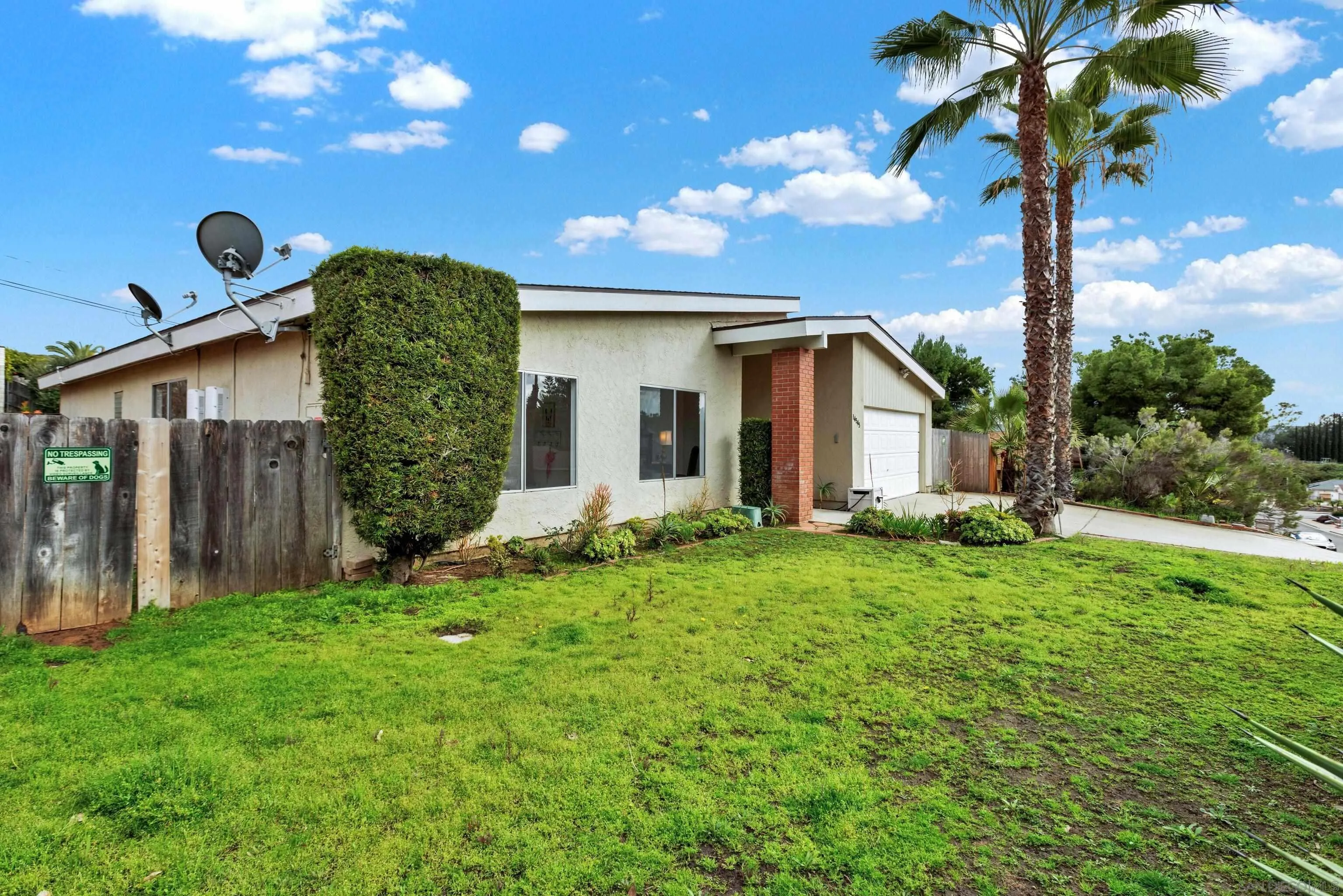 14545 Hillndale Way Poway, CA 92064 - Photo 3 of 52 a view of a house with backyard and garden