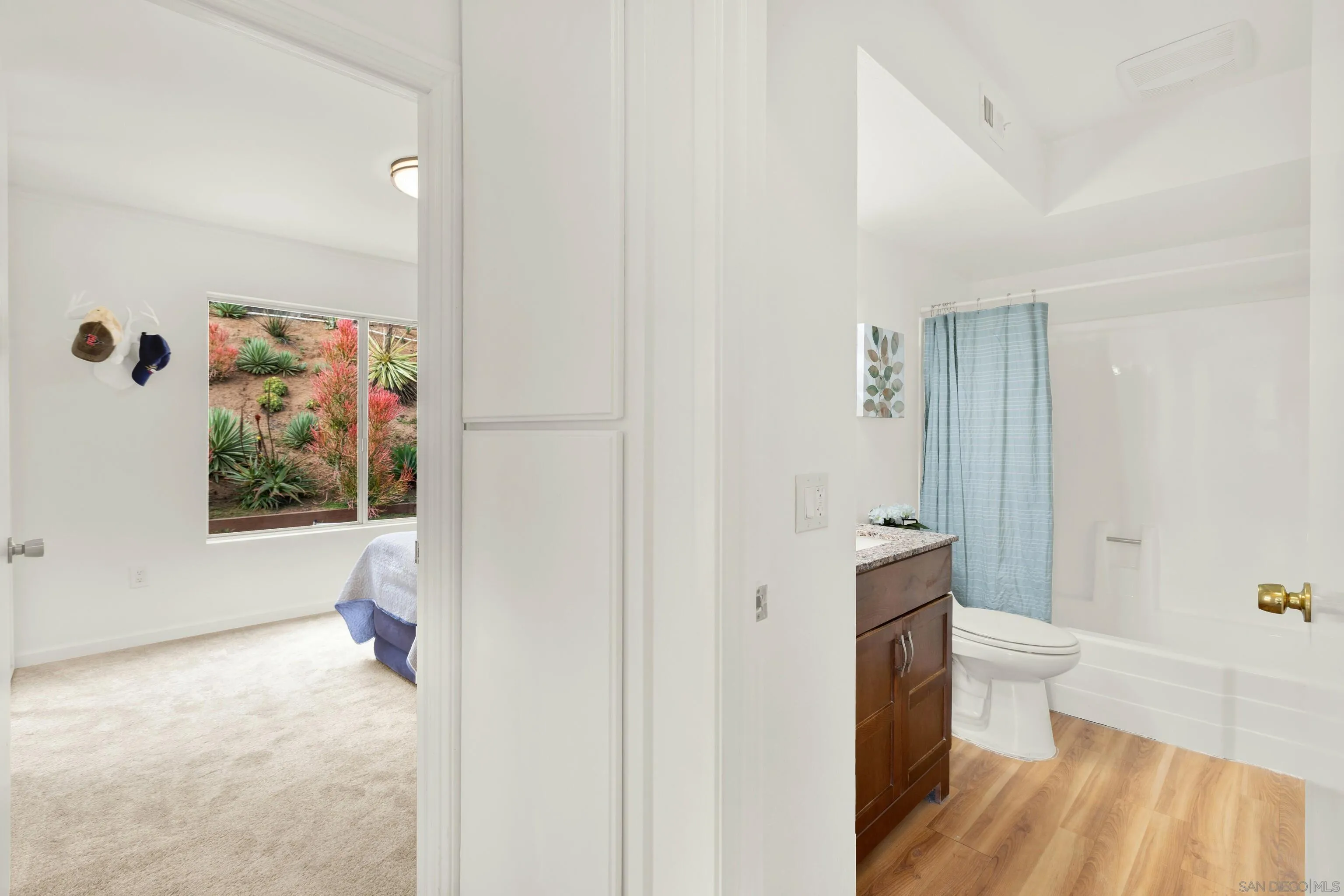 14545 Hillndale Way Poway, CA 92064 - Photo 42 of 52 a bathroom with a sink and a toilet