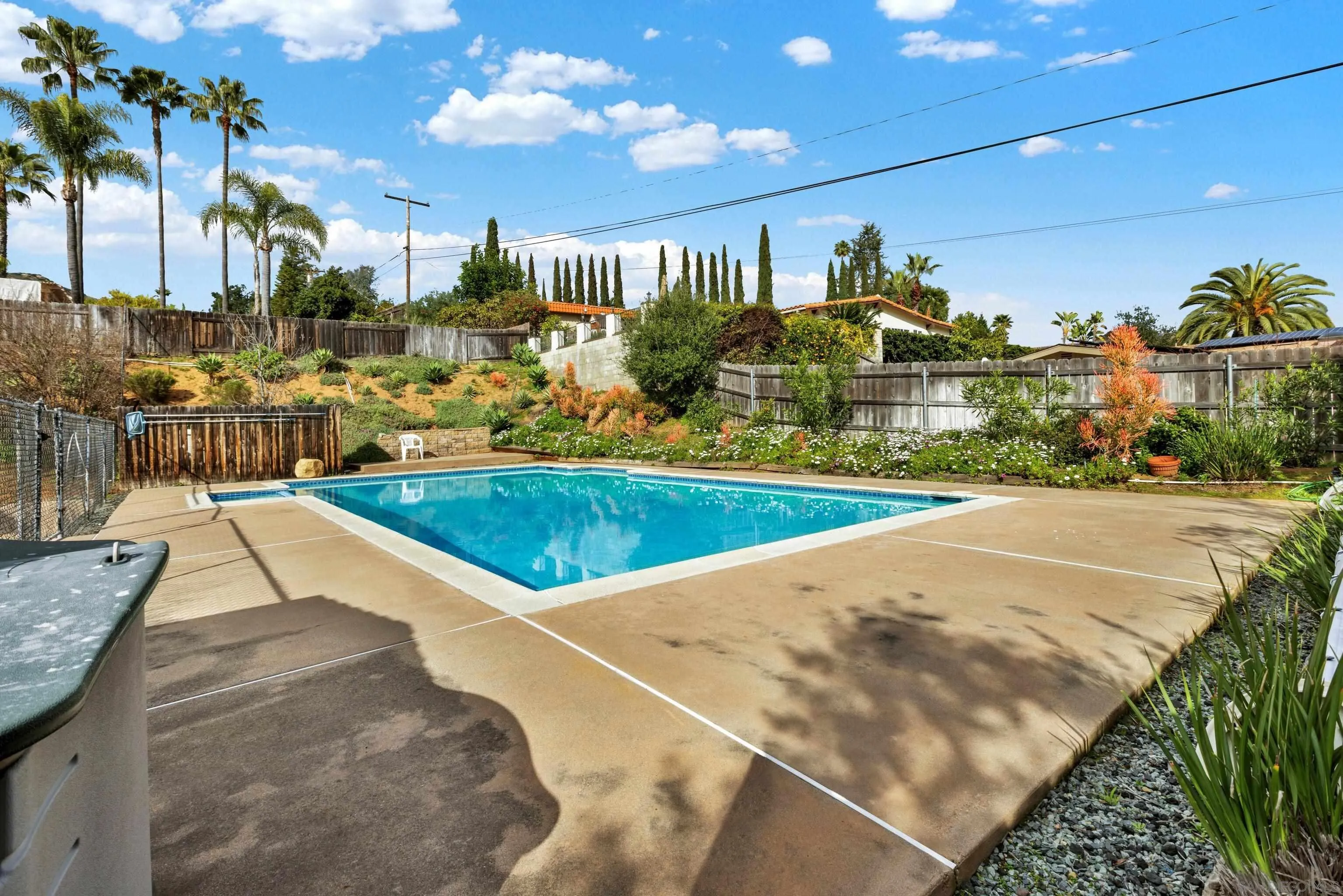 14545 Hillndale Way Poway, CA 92064 - Photo 47 of 52 a view of a swimming pool and a patio