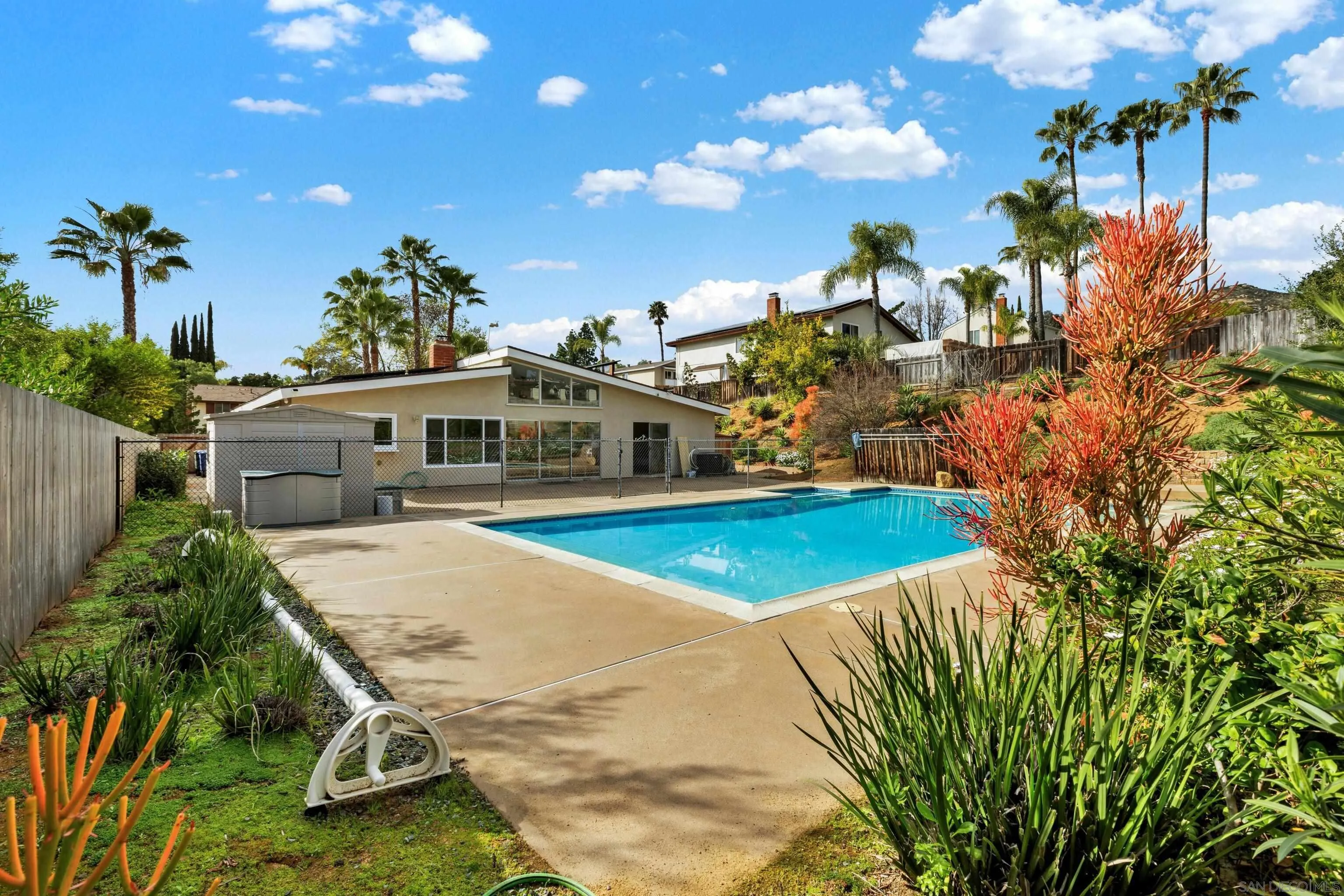 14545 Hillndale Way Poway, CA 92064 - Photo 48 of 52 a view of a house with a swimming pool