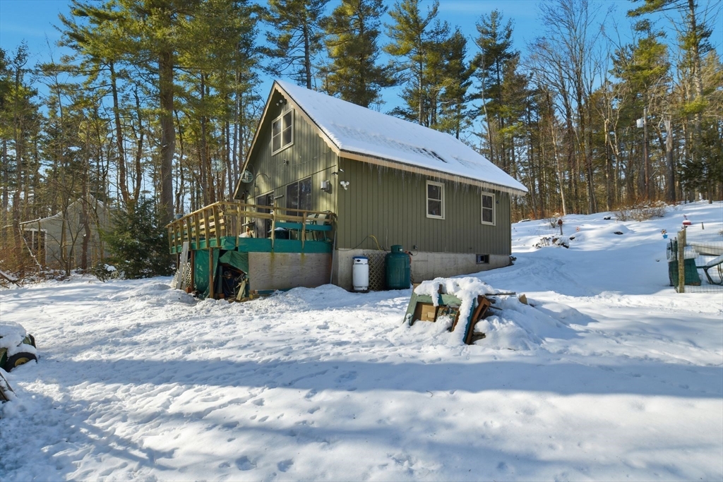 200 Fox Den Road Tolland, MA 01034 - Photo 29 of 37 a view of a house with a yard