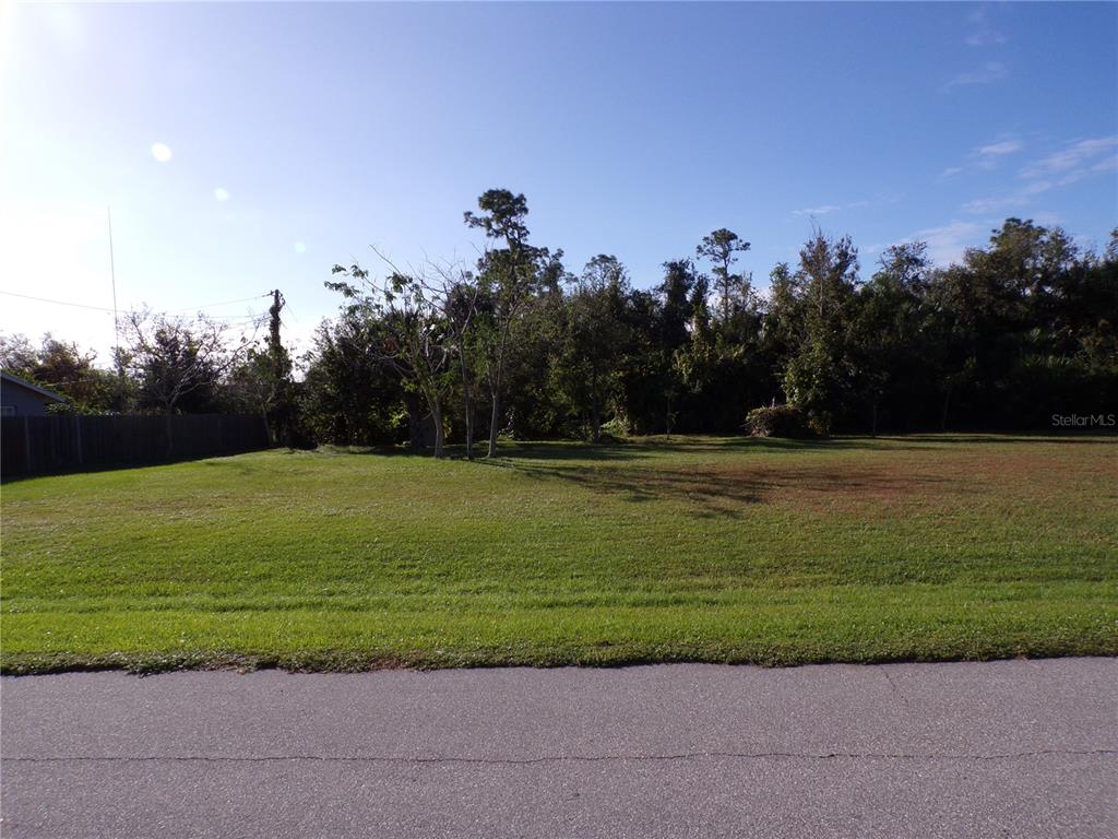 26487 Eager Road Punta Gorda, FL 33955 - Photo 1 of 1 a view of a golf course with a lake
