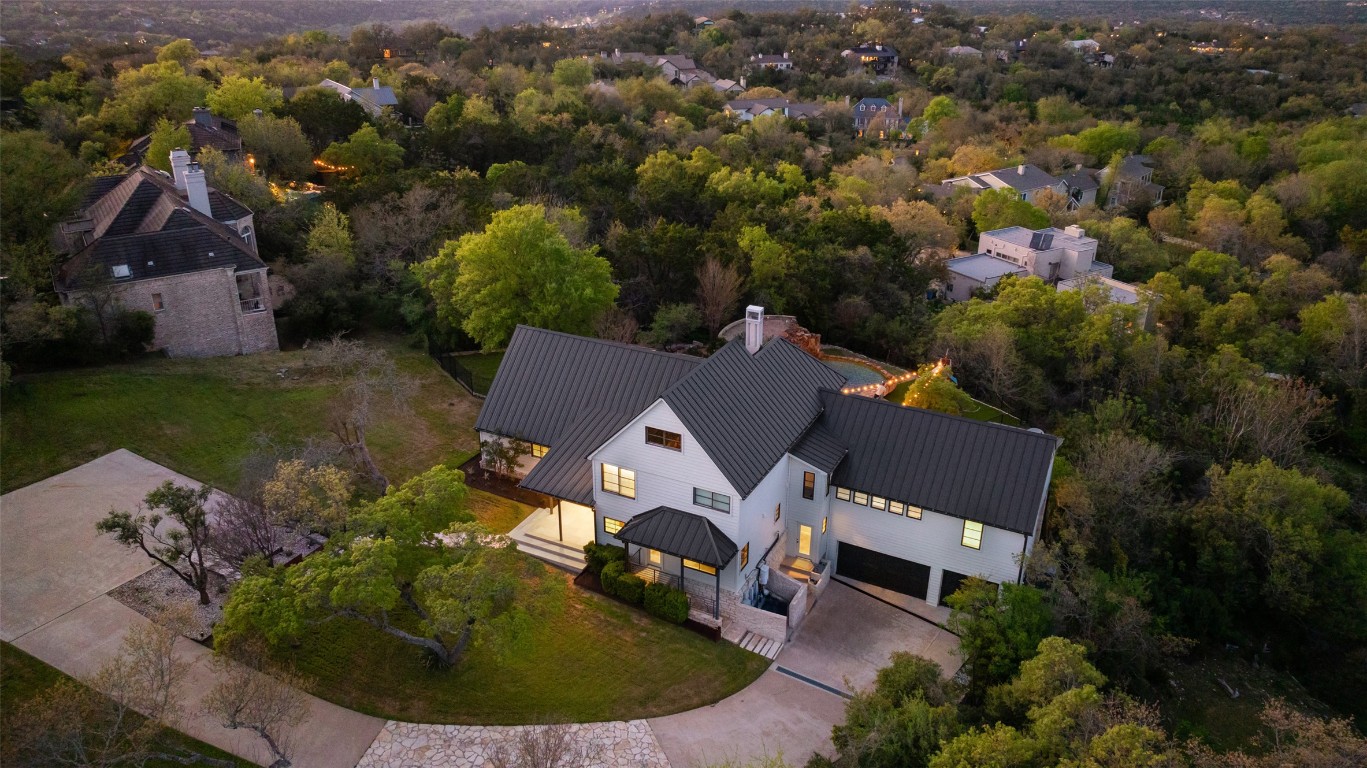 29 Pascal Lane Austin, TX 78746 - Photo 33 of 38 an aerial view of a house with yard swimming pool and mountains