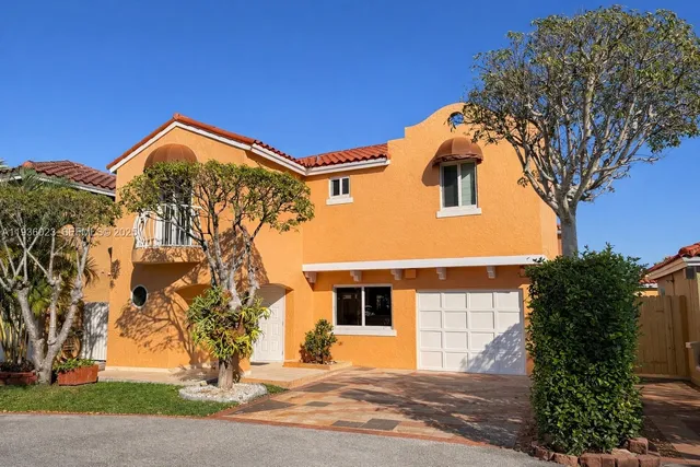 a view of a house with a street