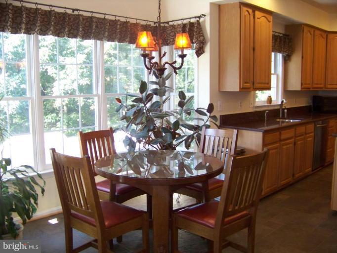 24 Farm Ridge Court Baldwin, MD 21013 - Photo 13 of 30 a dining room with furniture and window