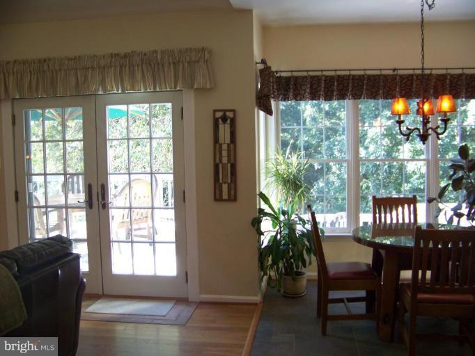 24 Farm Ridge Court Baldwin, MD 21013 - Photo 20 of 30 a living room with furniture and a potted plant
