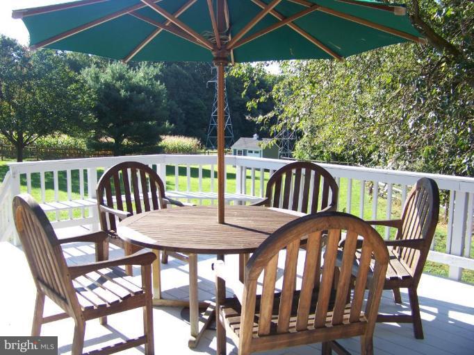 24 Farm Ridge Court Baldwin, MD 21013 - Photo 6 of 30 a view of a chairs and table in the patio