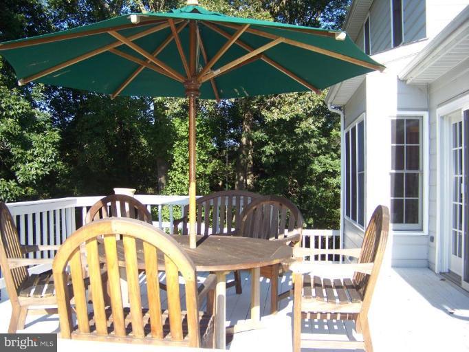 24 Farm Ridge Court Baldwin, MD 21013 - Photo 7 of 30 a view of a chair and table in the patio