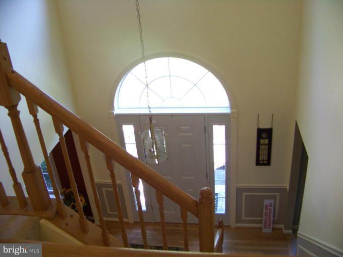24 Farm Ridge Court Baldwin, MD 21013 - Photo 9 of 30 a view of staircase with railing and a painting