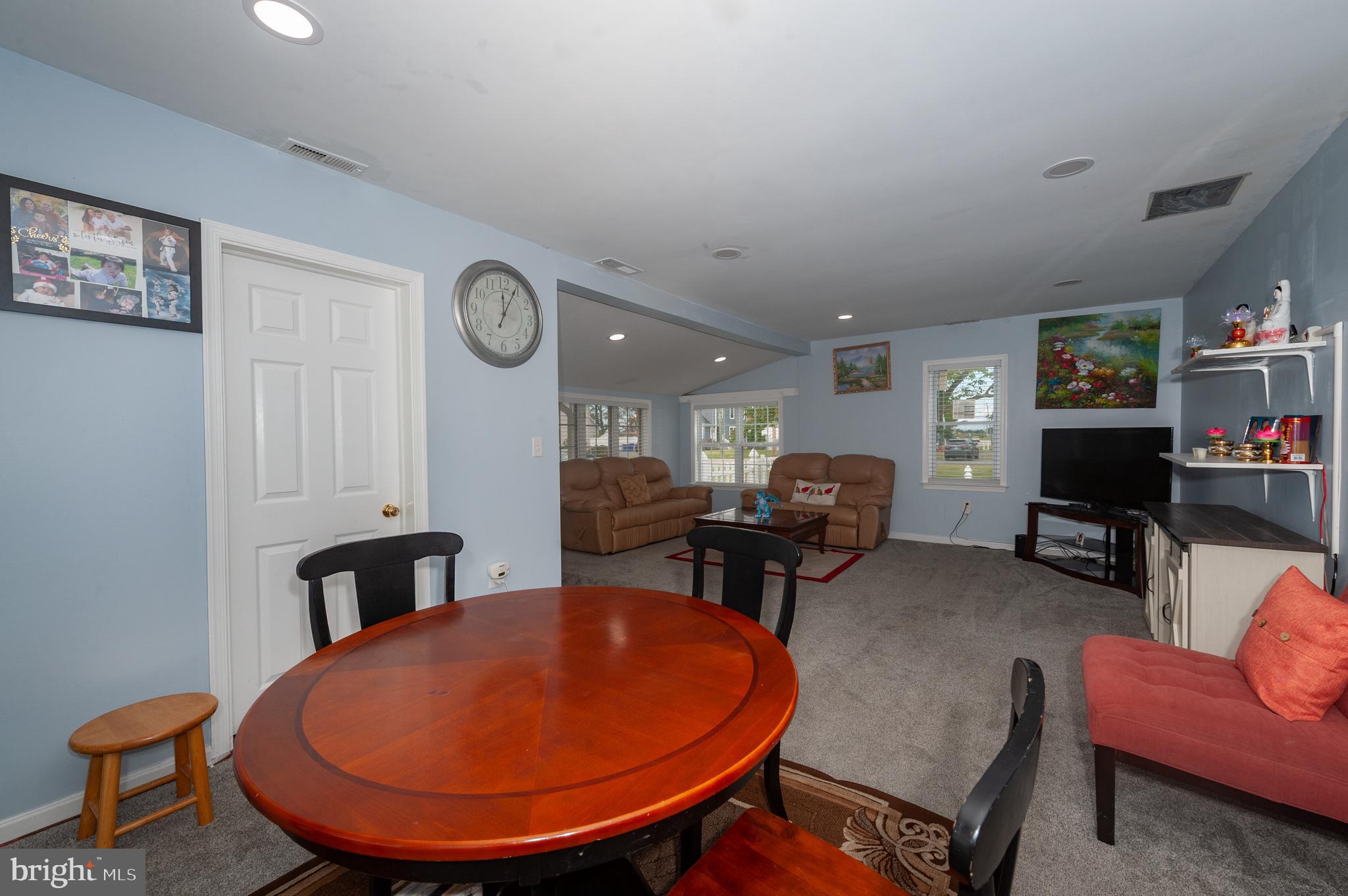3729 Main Street Grasonville, MD 21638 - Photo 12 of 30 a living room with furniture a rug and a lamp