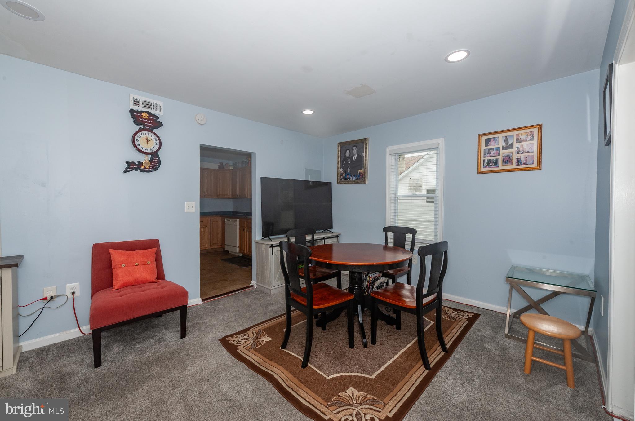 3729 Main Street Grasonville, MD 21638 - Photo 15 of 30 a dining room with furniture and wooden floor