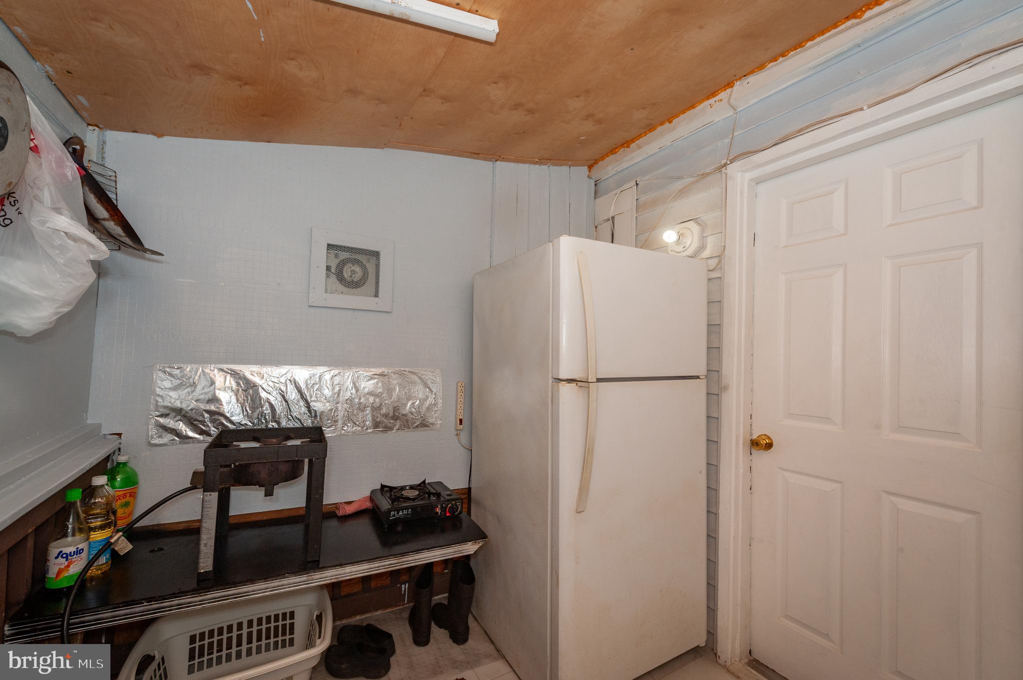 3729 Main Street Grasonville, MD 21638 - Photo 24 of 30 a room with furniture and a window