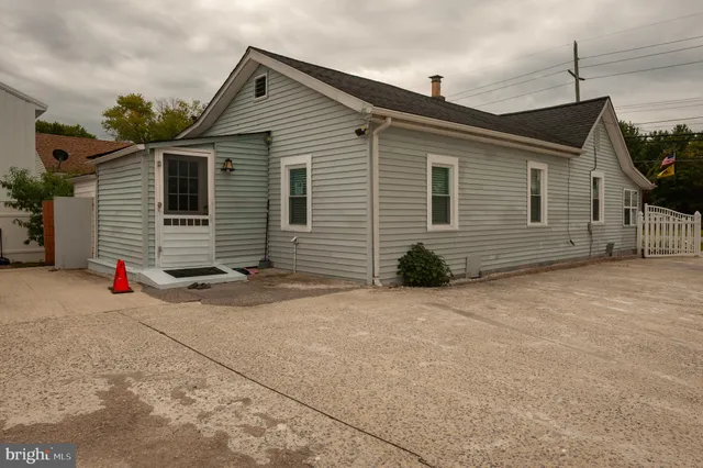 a front view of a house with a garage