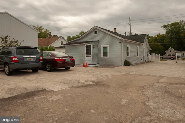 a view of car parked in front of house