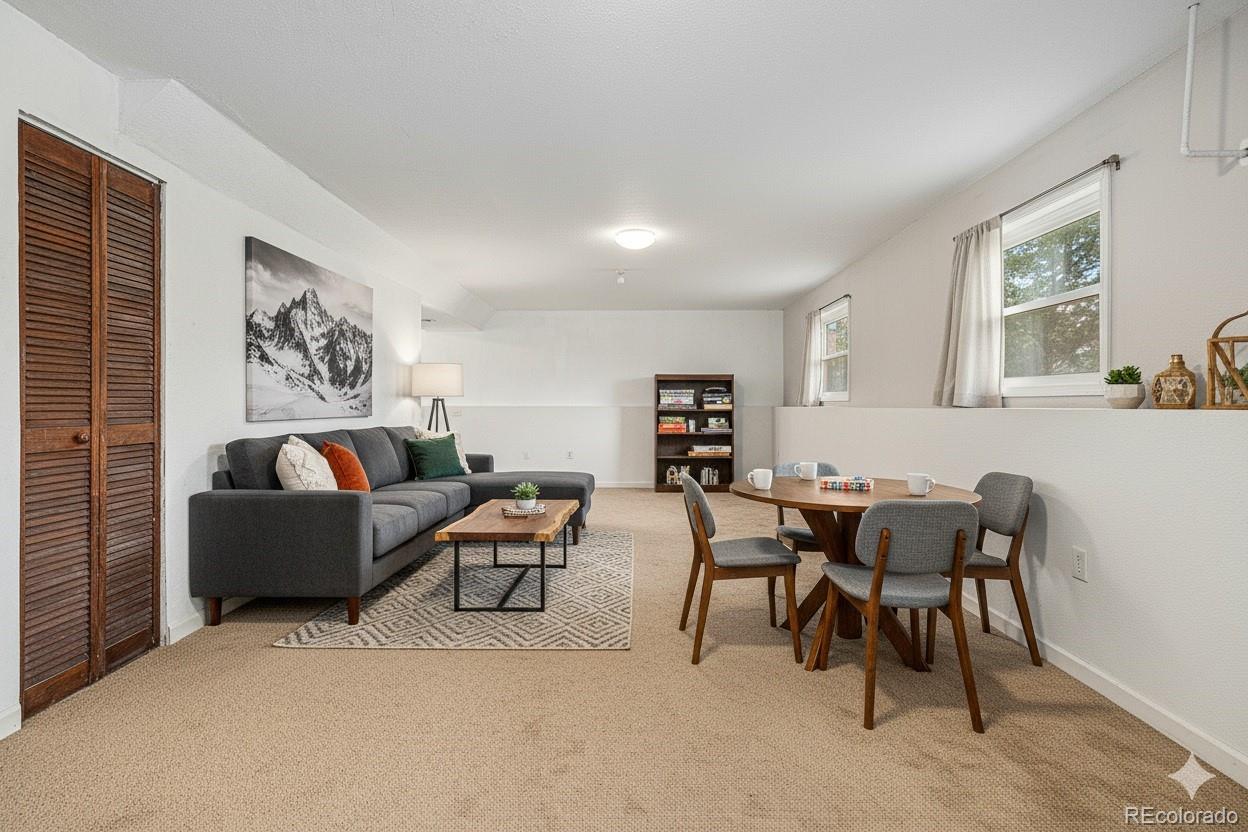 10142 South Turkey Creek Road Conifer, CO 80433 - Photo 21 of 48 a living room with furniture and a window