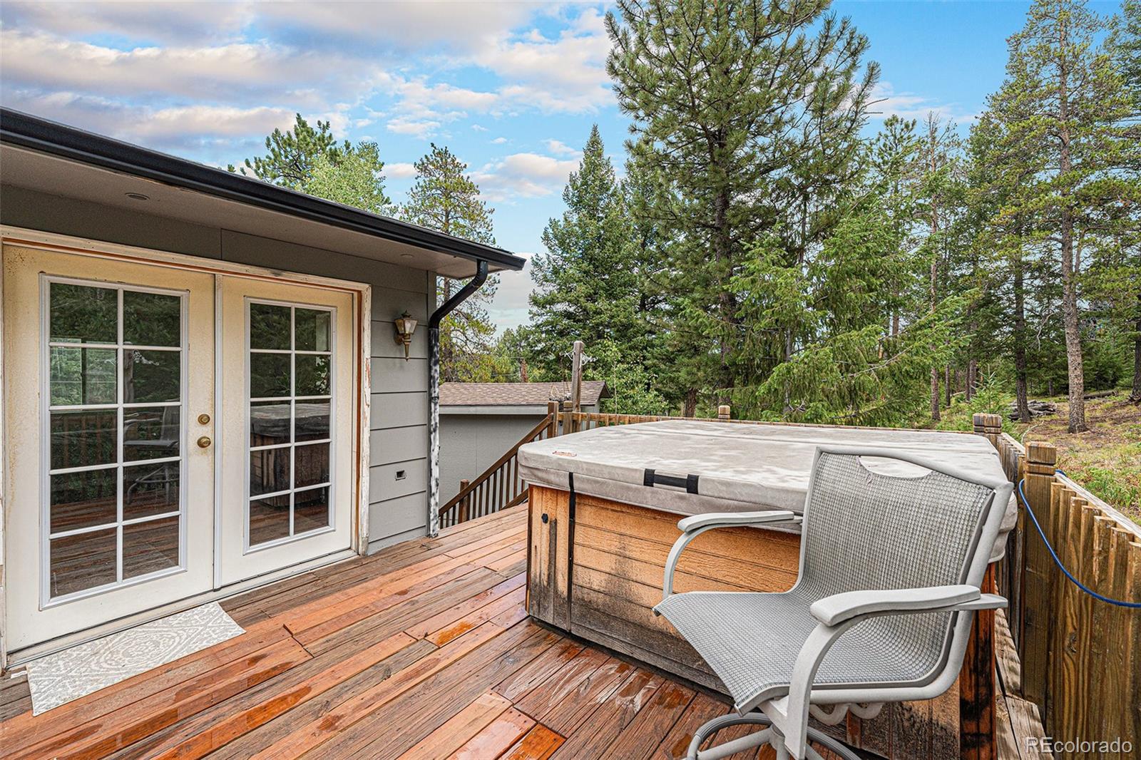 10142 South Turkey Creek Road Conifer, CO 80433 - Photo 27 of 48 a view of a patio on the roof deck