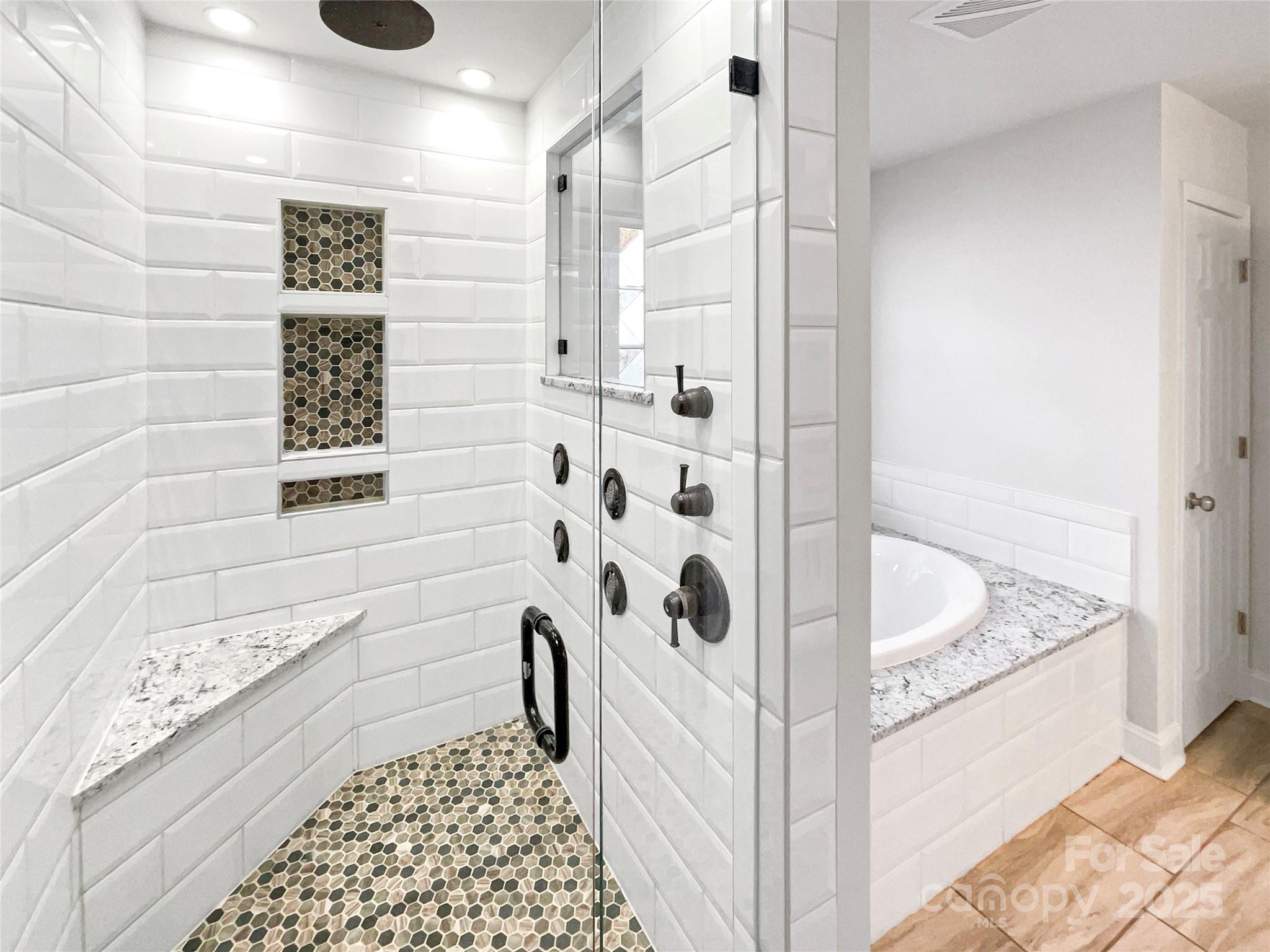 163 Scanlon Road Mooresville, NC 28115 - Photo 11 of 18 a bathroom with a bathtub and shower