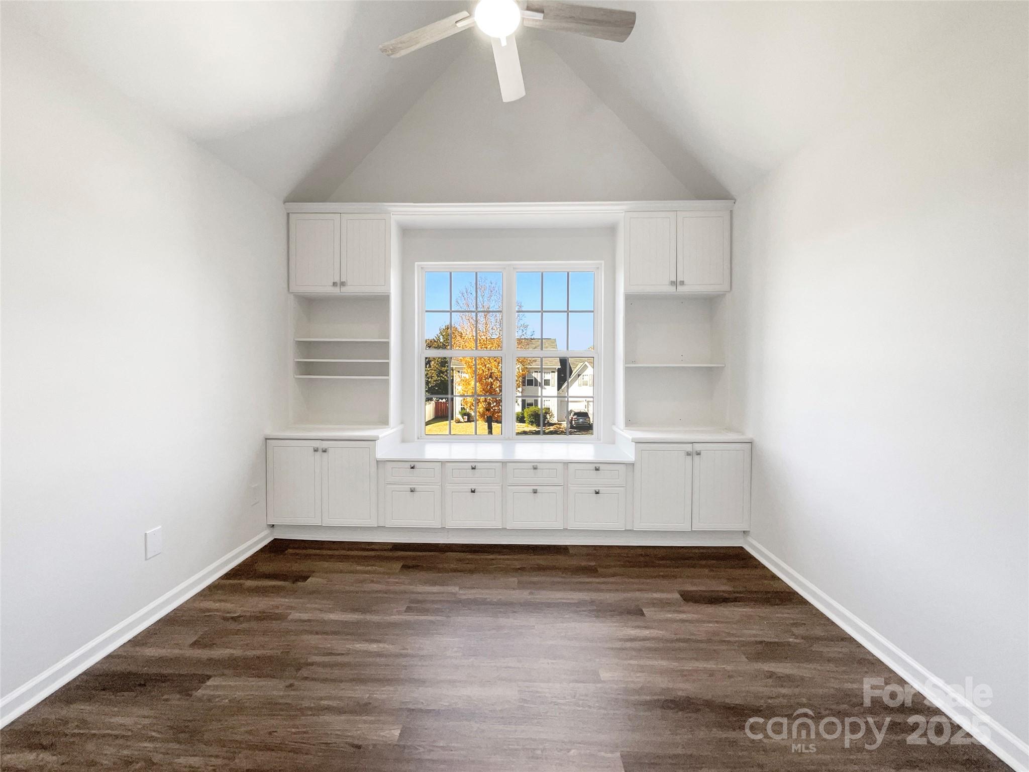 163 Scanlon Road Mooresville, NC 28115 - Photo 13 of 18 a view of kitchen and wooden floor