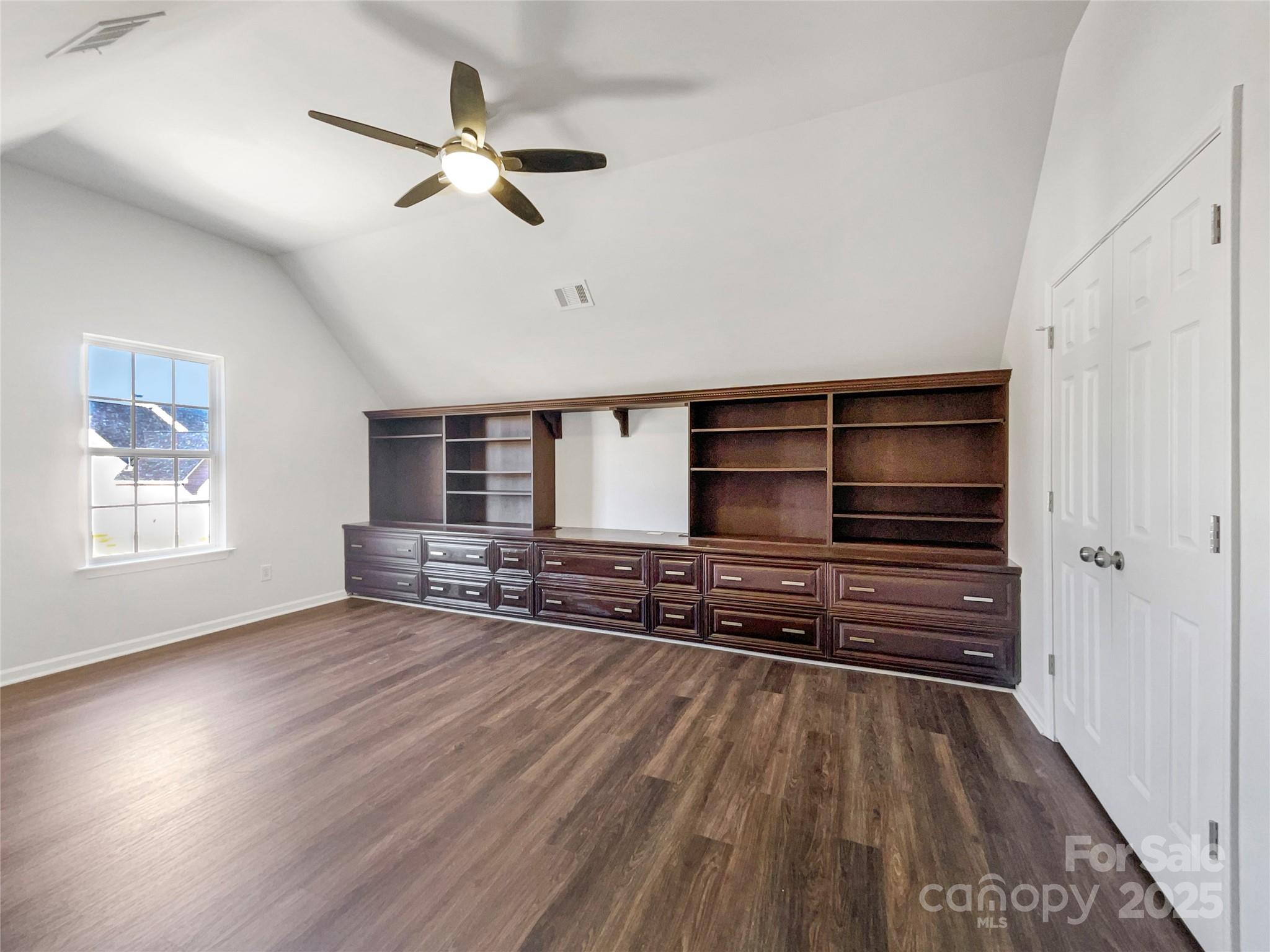 163 Scanlon Road Mooresville, NC 28115 - Photo 14 of 18 a view of wooden floor and windows in a room