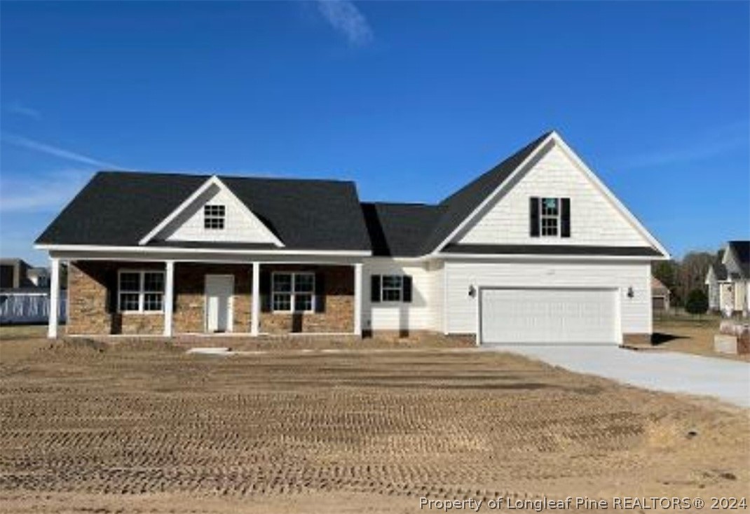2855 Hayfield Road Wade, NC 28395 - Photo 3 of 3 a front view of a house with a yard