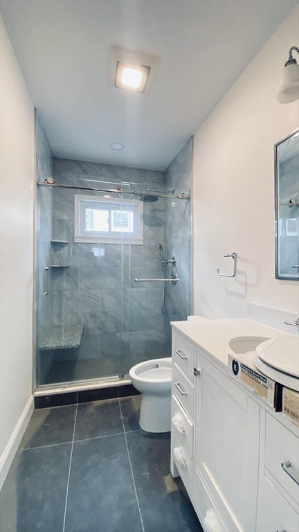 96 Brayton Road, Unit 1 Boston, MA 02135 - Photo 10 of 10 a bathroom with a sink a toilet and shower
