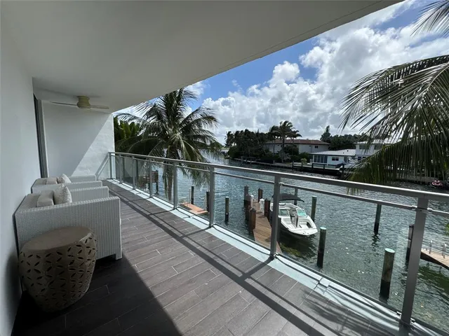 a balcony with furniture