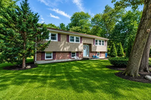 a house view with a garden space