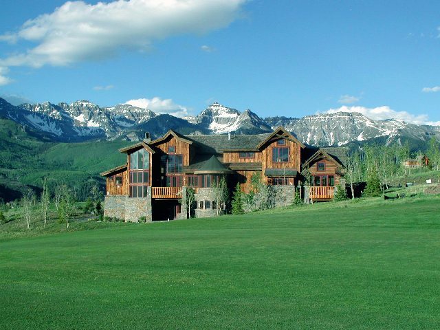 147 Adams Ranch Road Mountain Village, CO 81435 - Photo 1 of 9 a front view of house with yard and green space