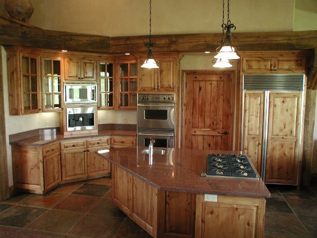 147 Adams Ranch Road Mountain Village, CO 81435 - Photo 6 of 9 a kitchen with refrigerator and cabinets