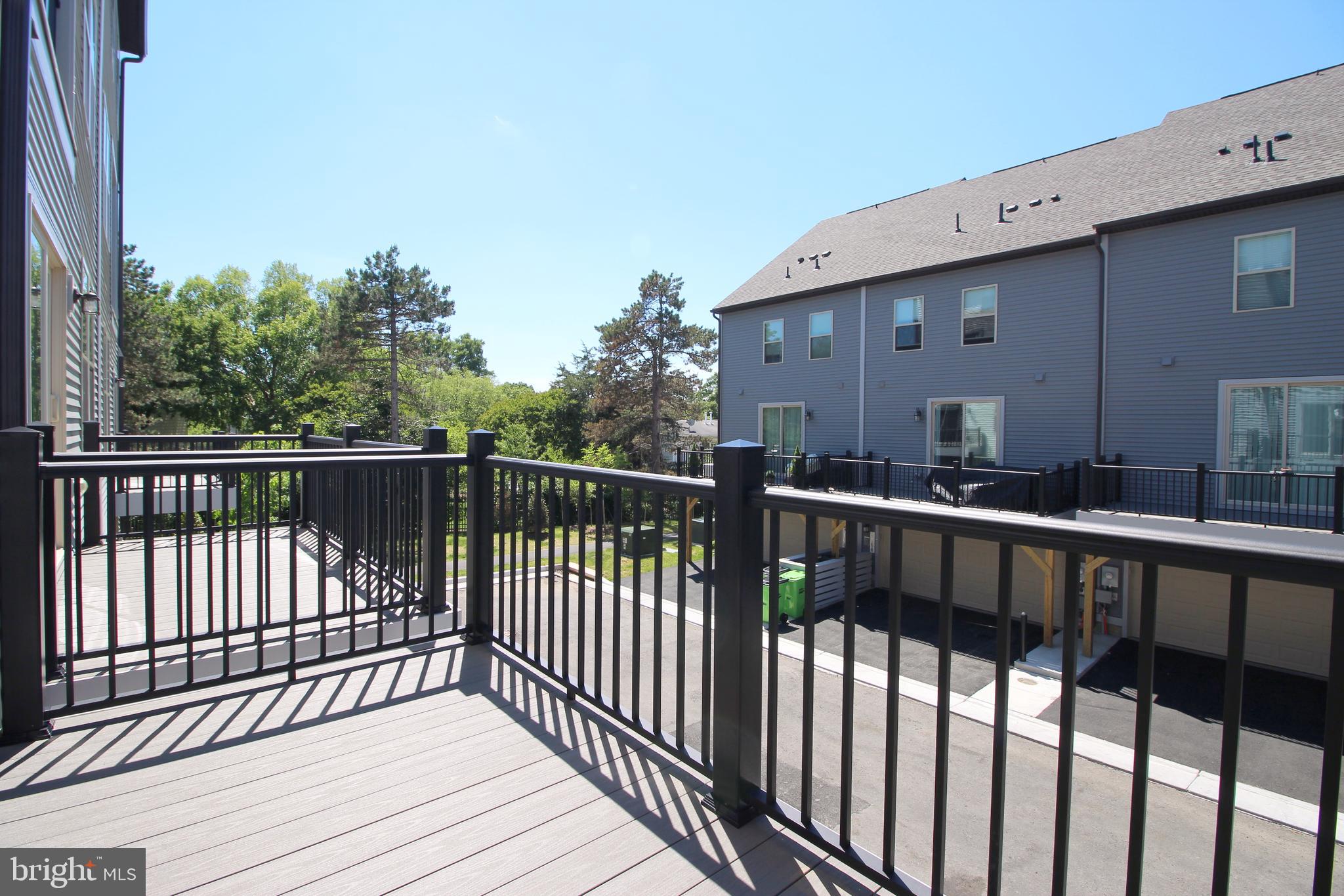 2154 Glacier Road, Unit 67 Herndon, VA 20170 - Photo 28 of 30 a view of a balcony with wooden floor