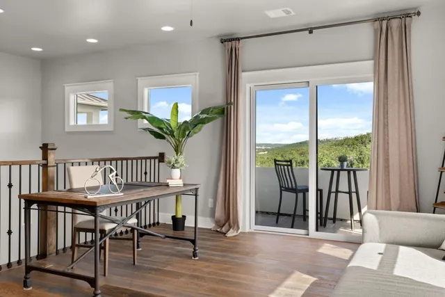 a spacious bedroom with a bed and a couch