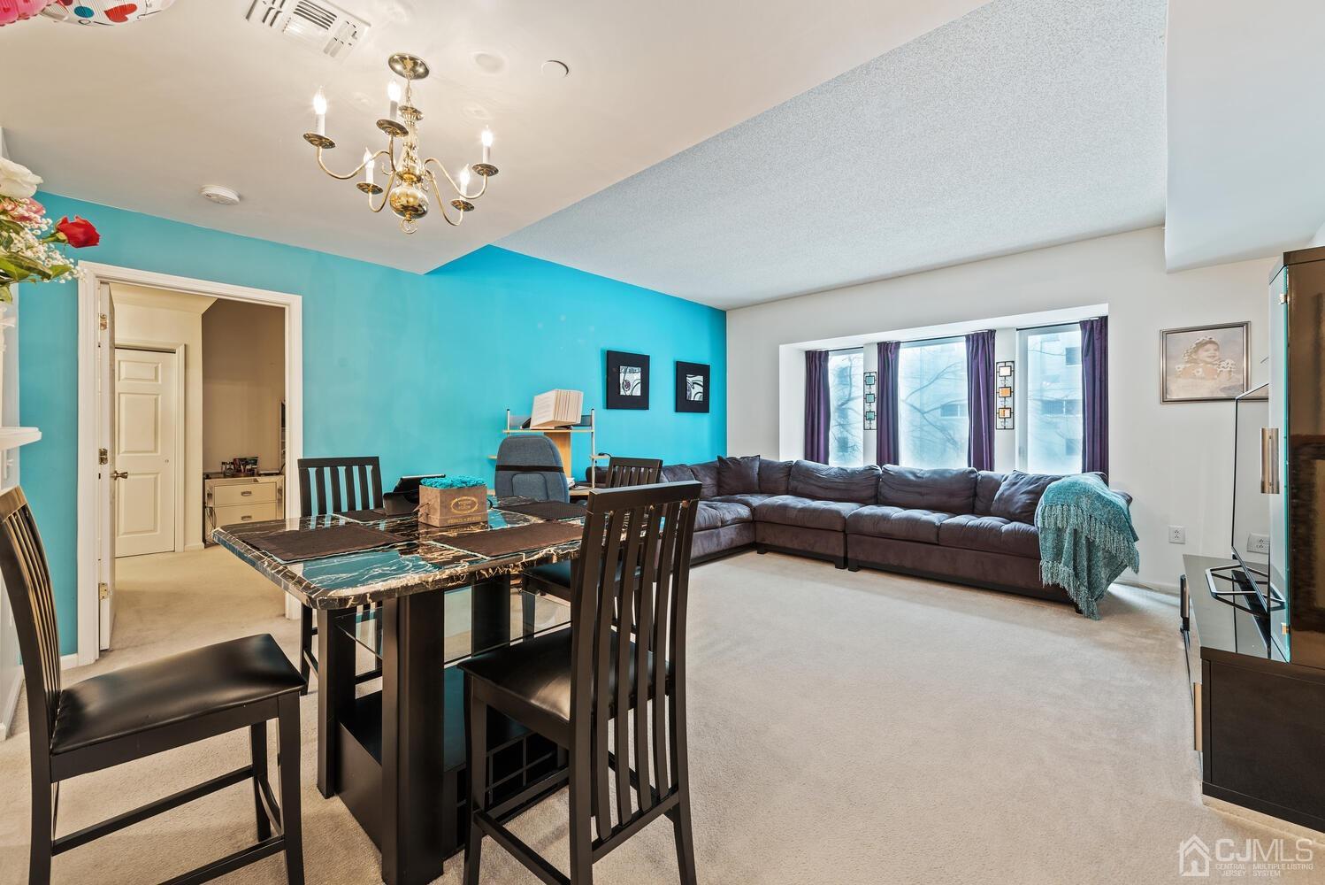 358 Rector Street, Unit 407 Perth Amboy, NJ 08861 - Photo 15 of 28 a view of a dining room and livingroom view