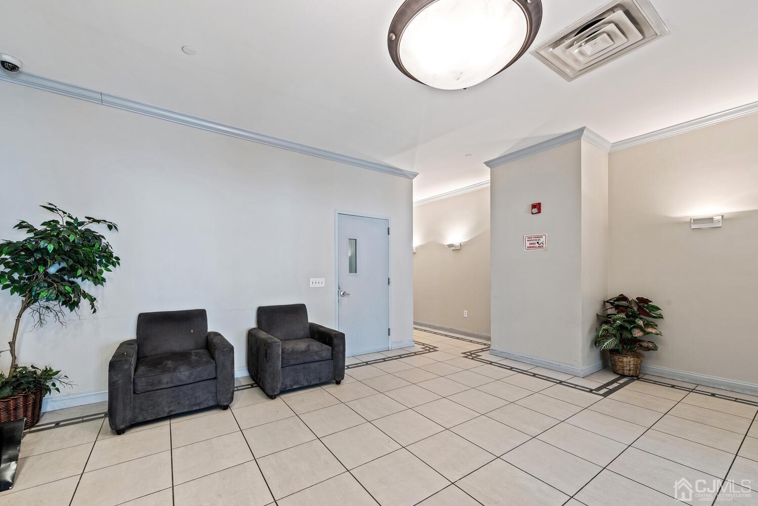 358 Rector Street, Unit 407 Perth Amboy, NJ 08861 - Photo 5 of 28 a living room with furniture