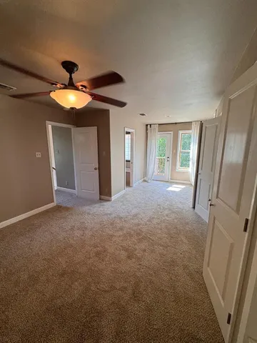 a bathroom with a sink toilet and mirror