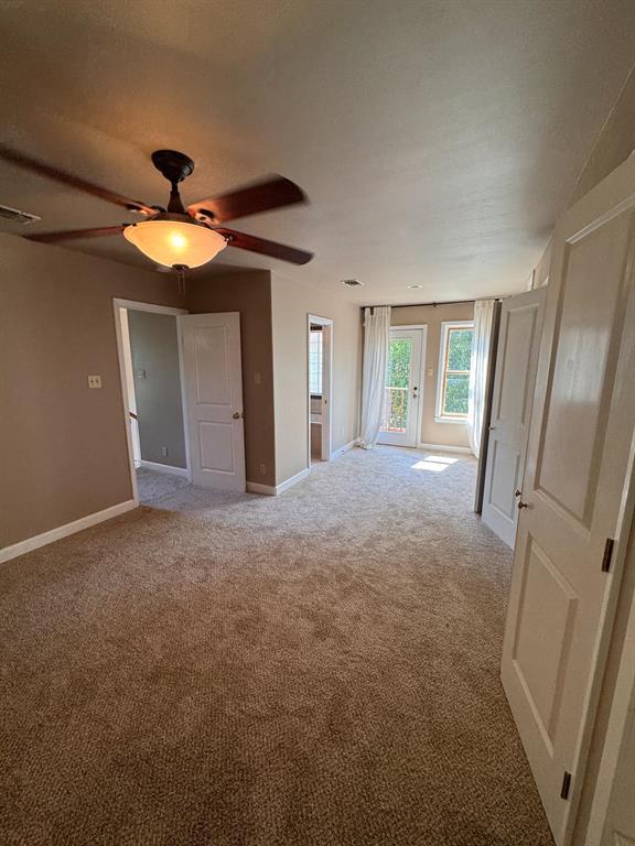 201 West 33rd Street, Unit B Austin, TX 78705 - Photo 16 of 27 a view of a livingroom with an empty space and a fireplace