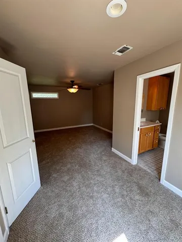 a view of balcony with wooden floor